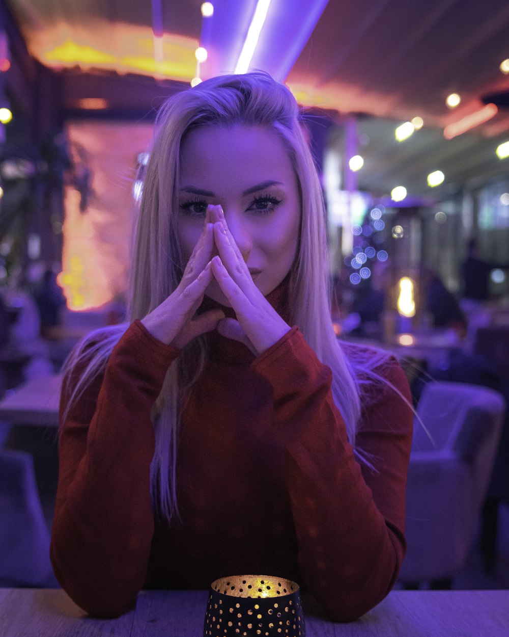 portrait of woman wearing red sweater