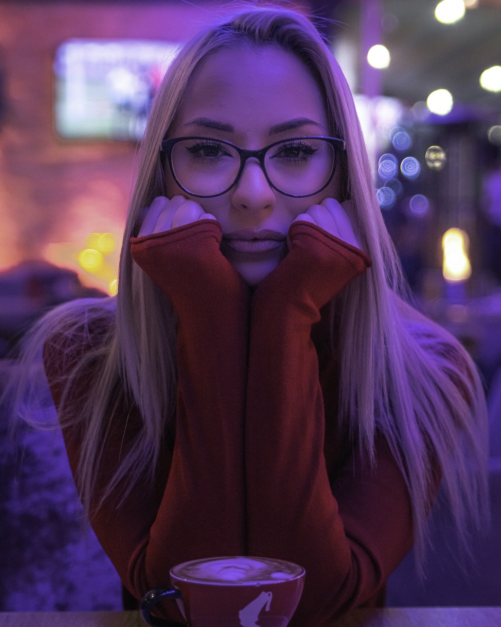 woman wearing red long-sleeved shirt