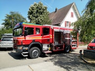 Emergency response vehicle parked outside a residential home.