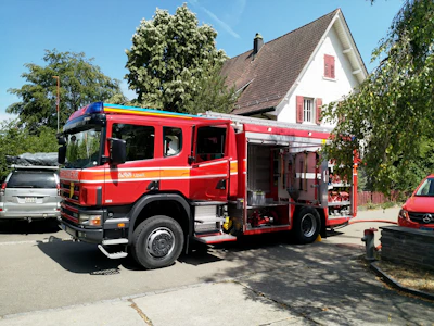 Emergency response vehicle parked outside a residential property in Atlanta.
