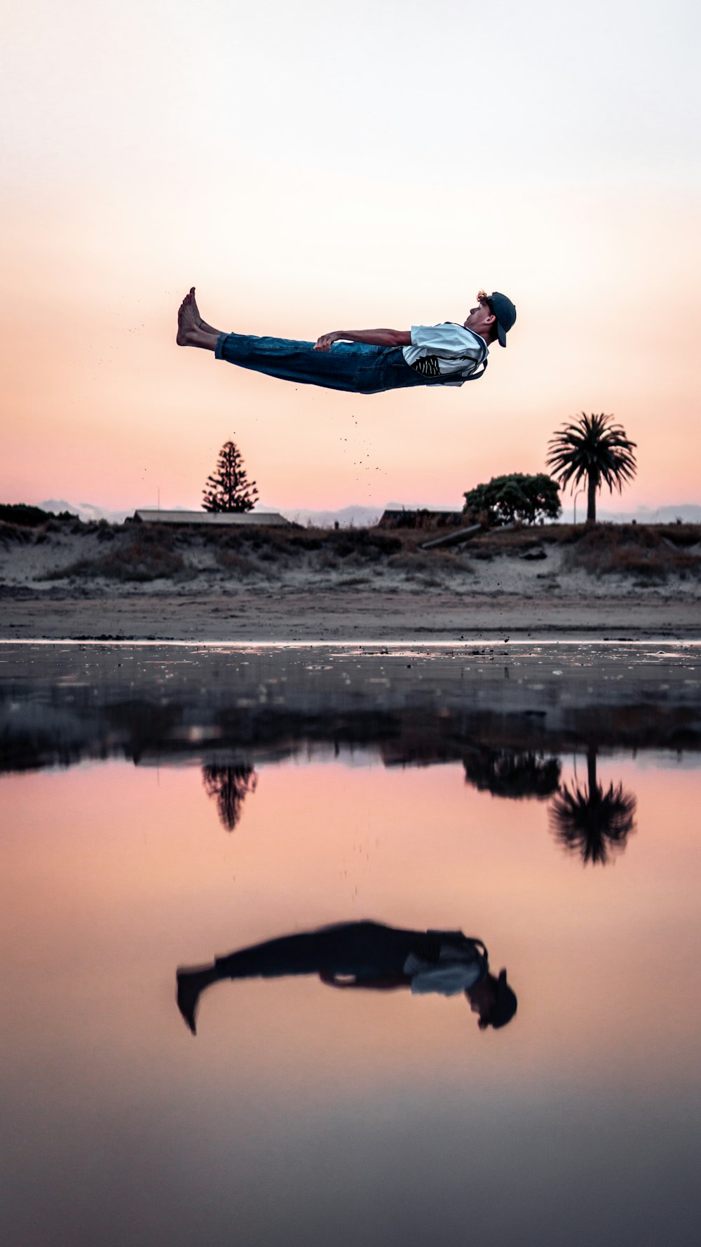 man above body of water during daytime