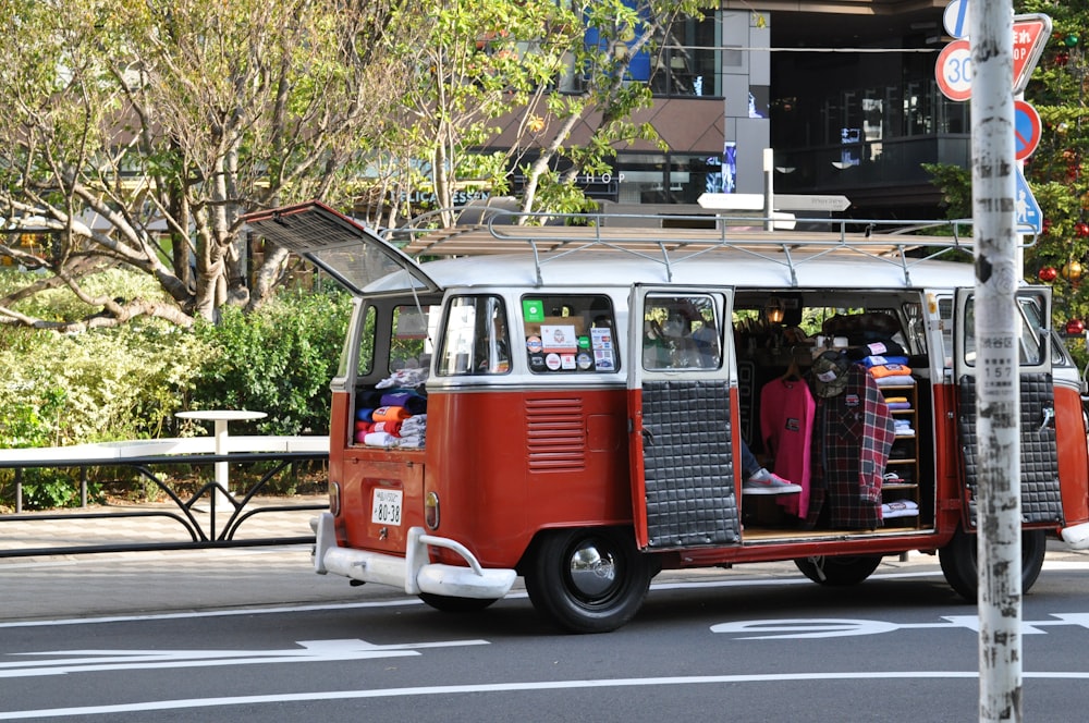 red and white van with clothes