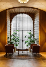 A cozy space set up for couples therapy with two chairs facing each other.