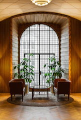 A warm, inviting space with two chairs facing each other, ready for a couples session.