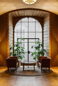 A cozy space set up for couples therapy with two chairs facing each other.