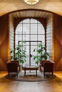 A cozy living room scene with two chairs facing each other, suggesting a meaningful conversation.