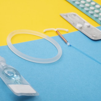 a medical device is laying on a blue and yellow surface