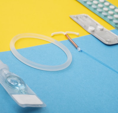 a medical device is laying on a blue and yellow surface