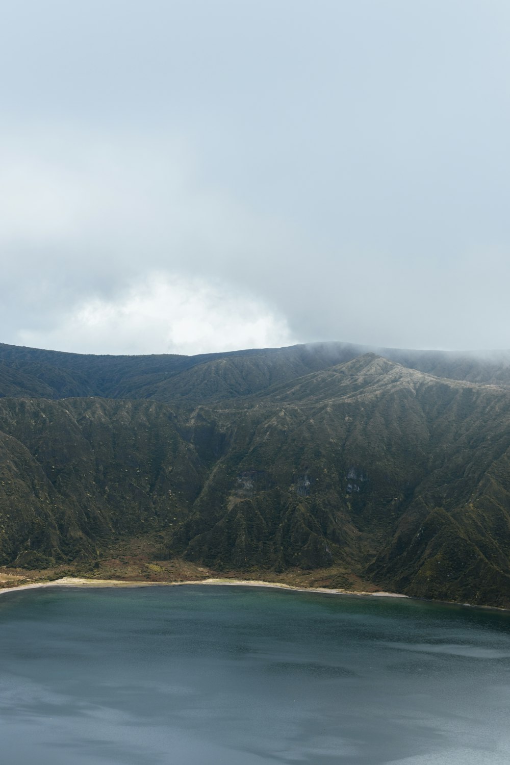 landscape photography of mountain near body of water