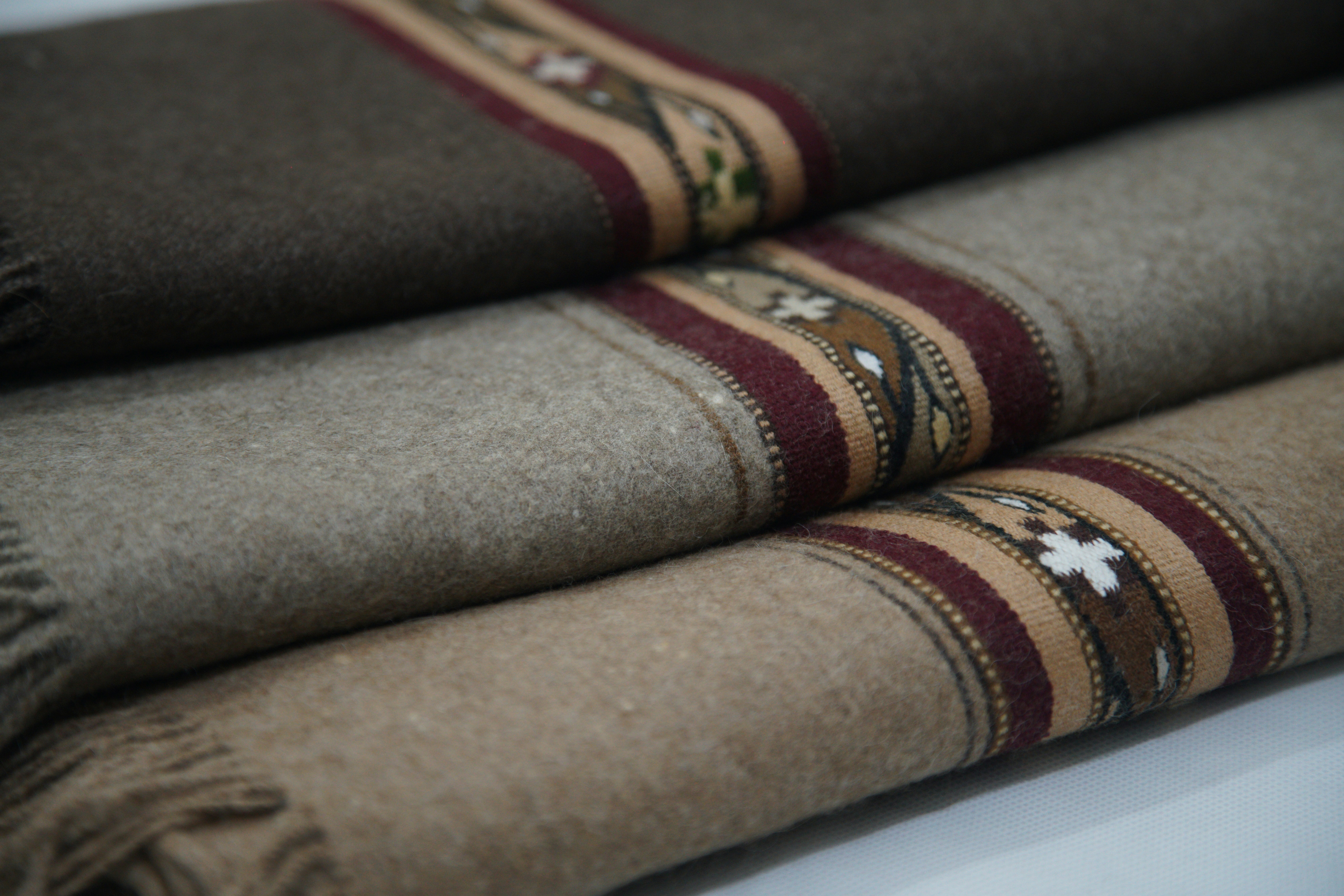 Hand Made Gents’ Chadar made from 100%  local sheep wool , handspun. The length and width of the chadar are  270 x 130 Cm respectively having about 1000 gram of weight. These are available in many colours. For details please click https://www.elumtac.com/index.php/product/hand-made-gents-chadar-12/ 
