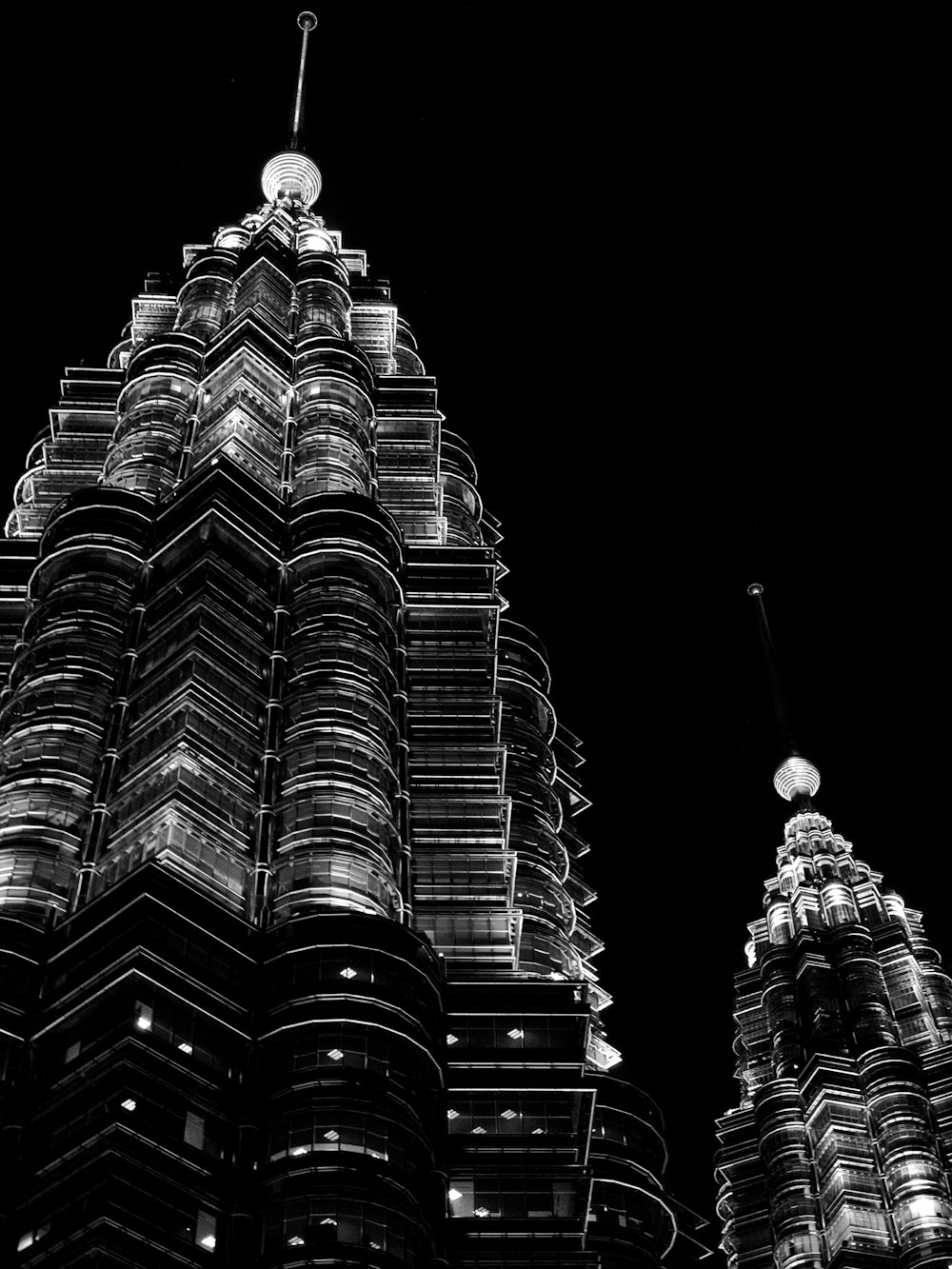 grayscale photography of Petronas Tower