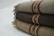 A satisfied customer wrapped in a luxurious wool blanket.