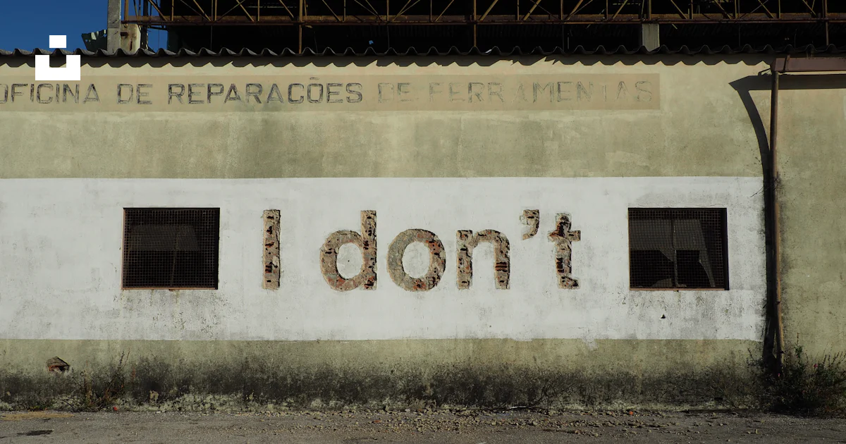 A building with a sign that says i don't photo – Free Wall Image on ...