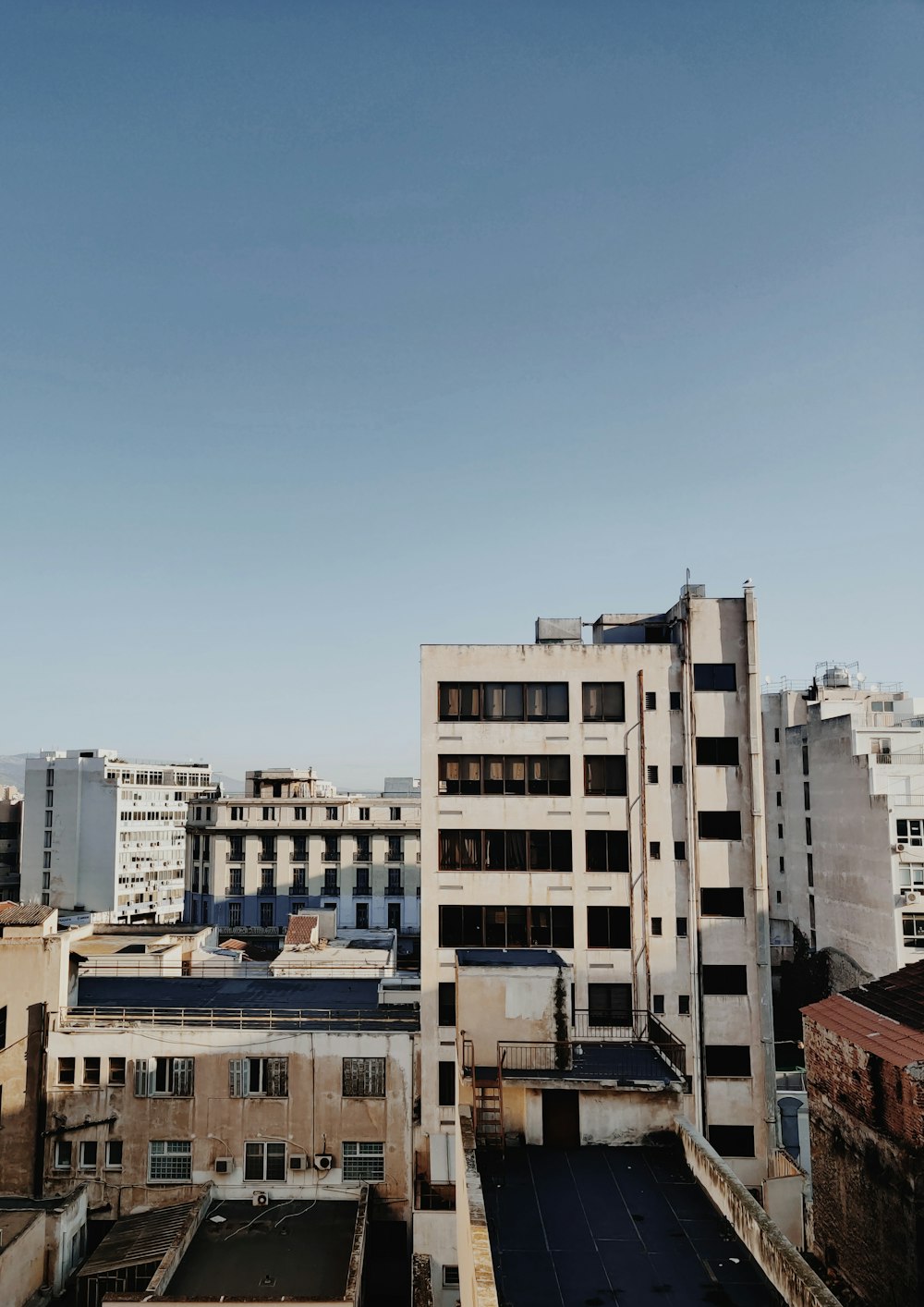 white high-rise building during daytime