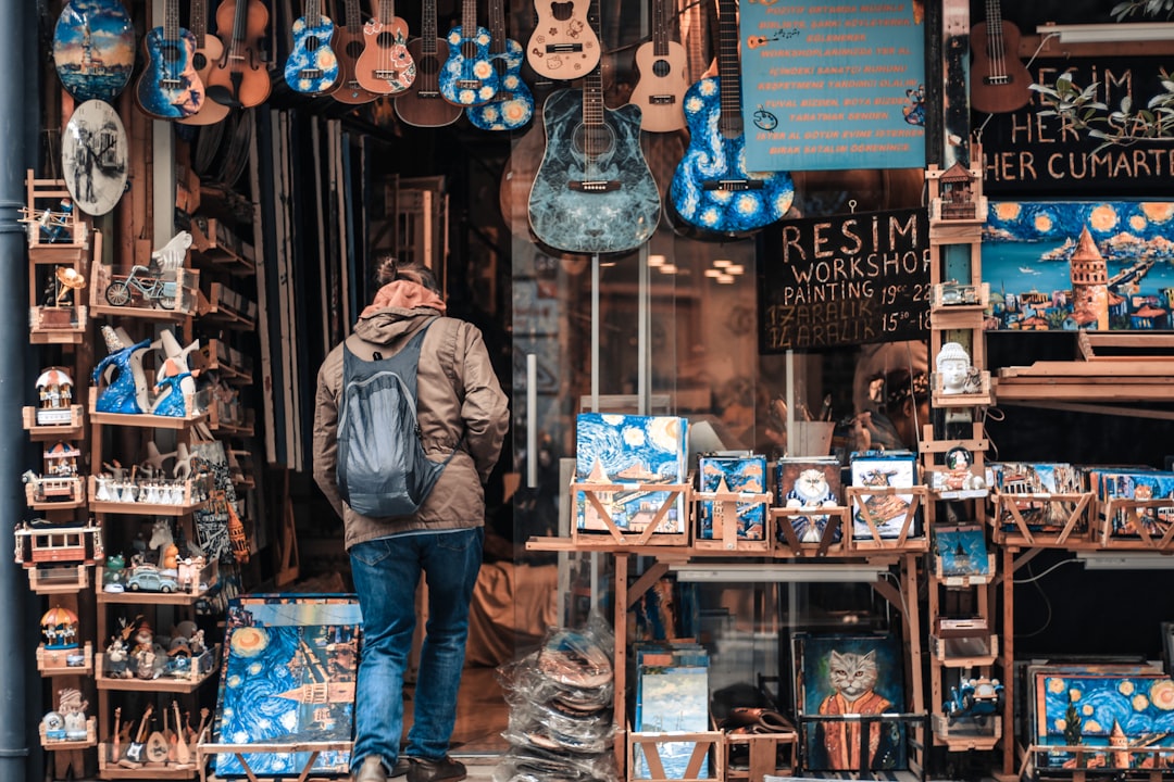 man wearing brown backpack