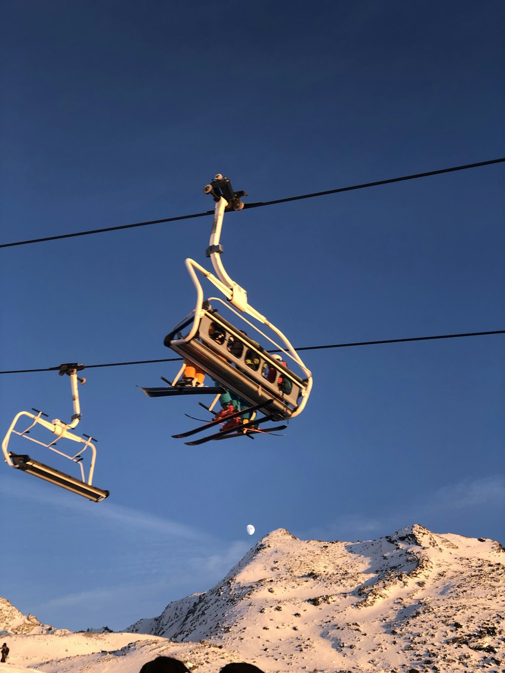 a ski lift with two people on it