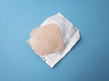square brown tissue and white paper pack