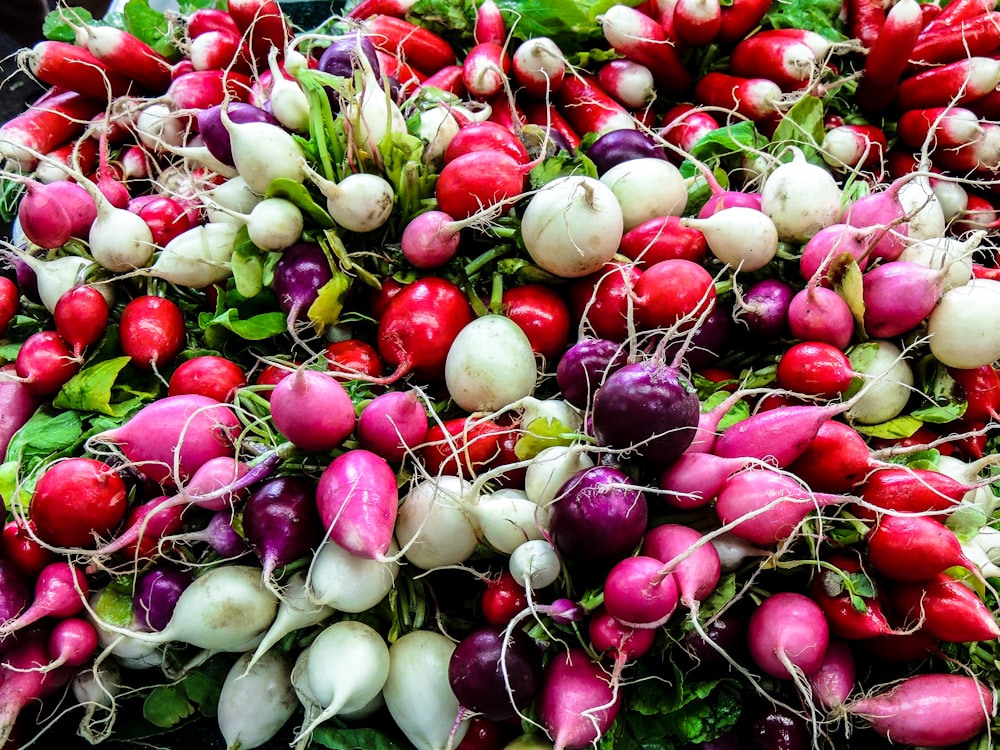 bunch of white, red and purple radishes