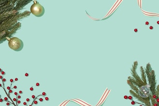 A flat lay of festive jewelry pieces surrounded by seasonal decorations.