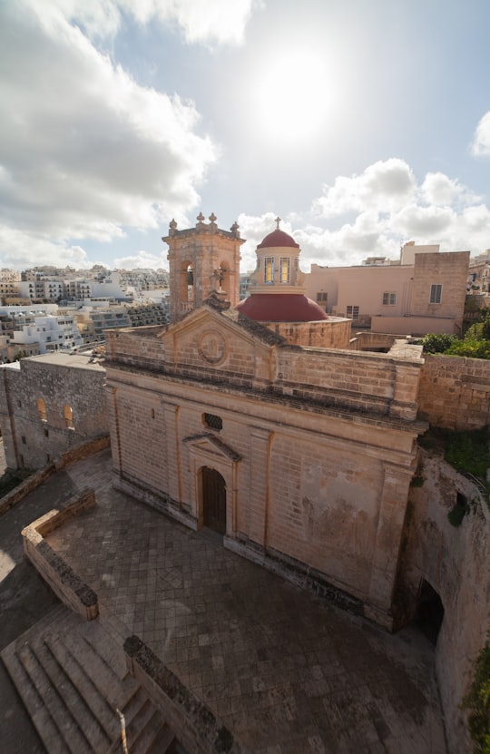 buildings during day in Parish Church of Mellieha Malta