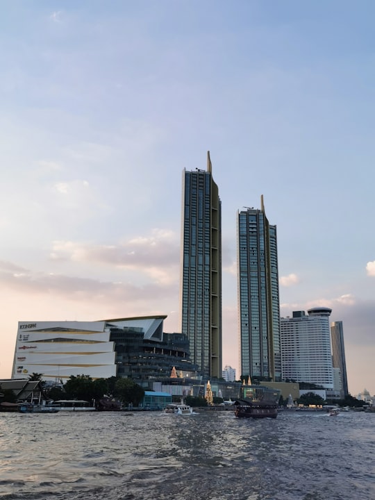 city with high-rise buildings near body of water under blue and white sky in Jack's Bar Thailand