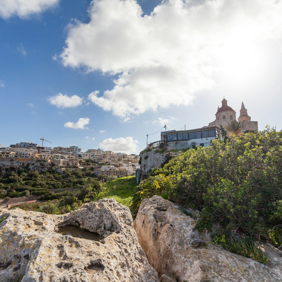 low-angle photography of a castle under a cloudy sky