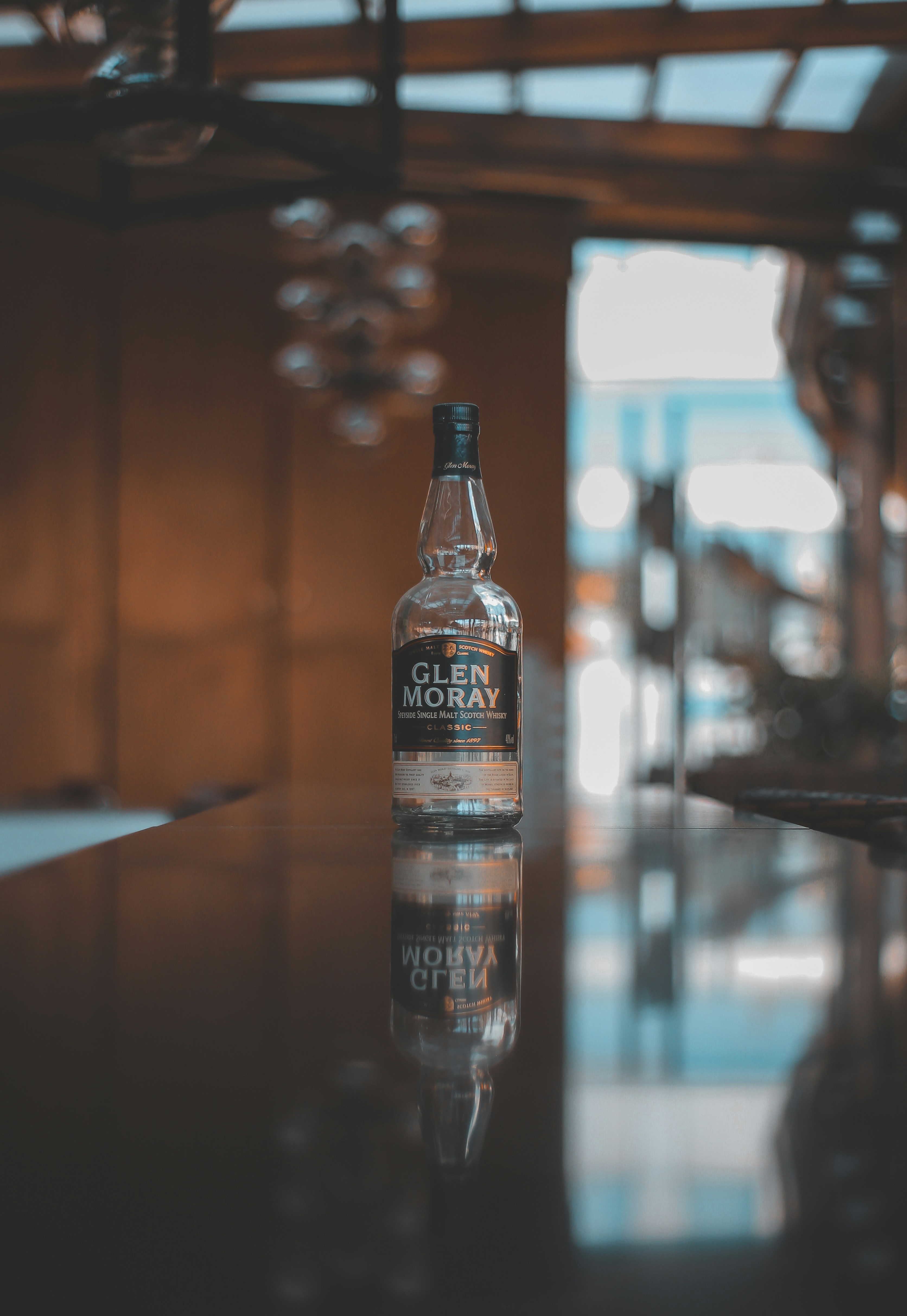 空のグレンマレー ガラス飲料ボトルの写真 Unsplashで見つける茶色の無料写真