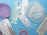 Various contraceptive methods are displayed including birth control pills in blister packs, a diaphragm, a female condom, an intrauterine device (IUD), and an implant. The background is a solid light blue surface.