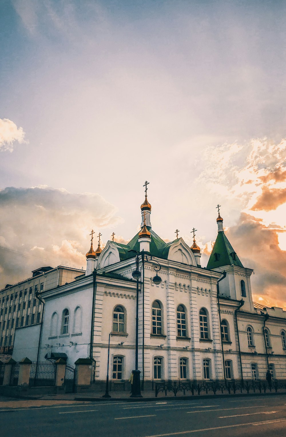 architectural photography of white and green cathedral