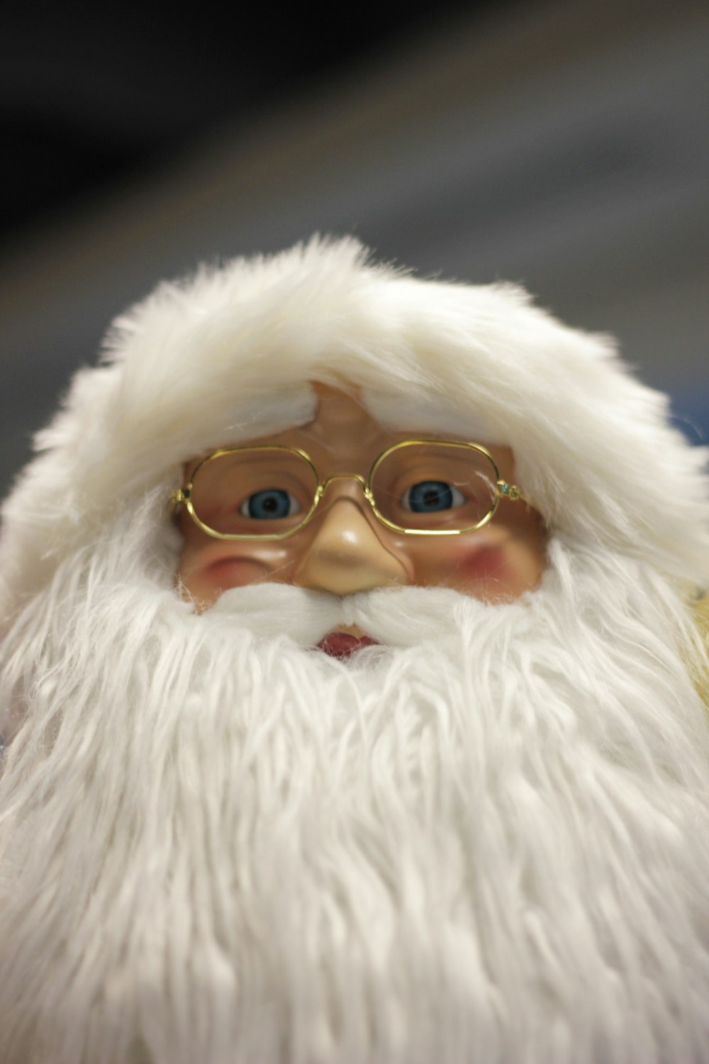 selective focus photography of Santa Claus doll