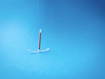 a toothbrush with a toothpick sticking out of it
