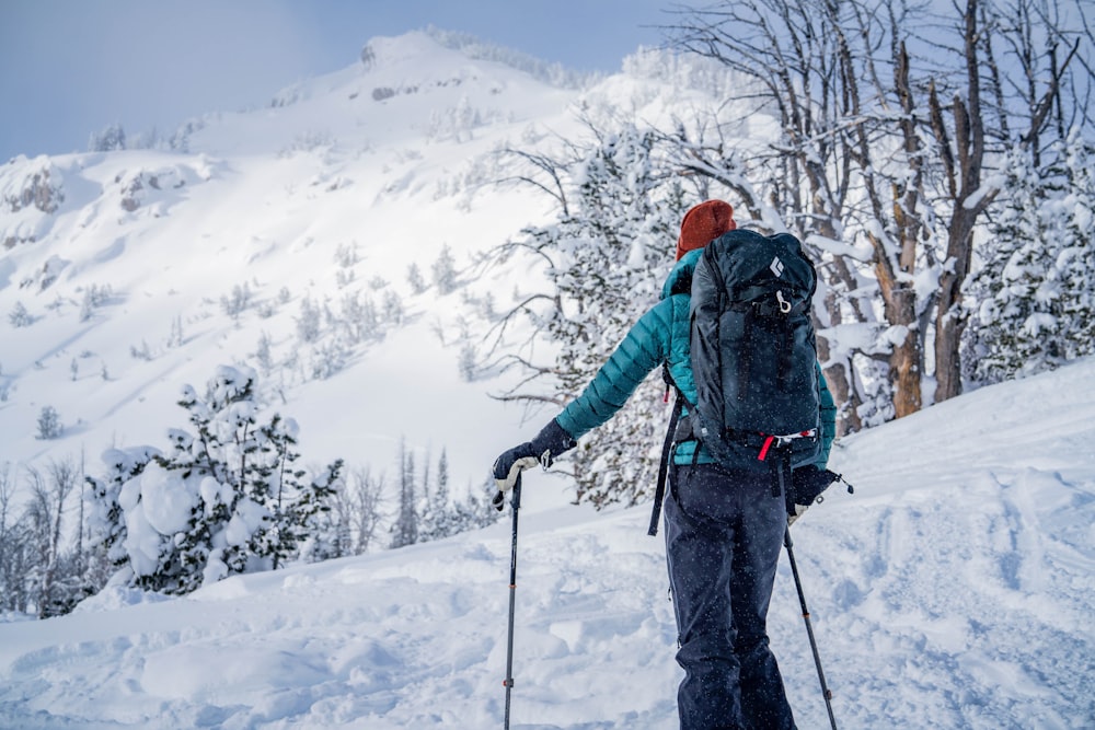 man skiing in a snowy mountain