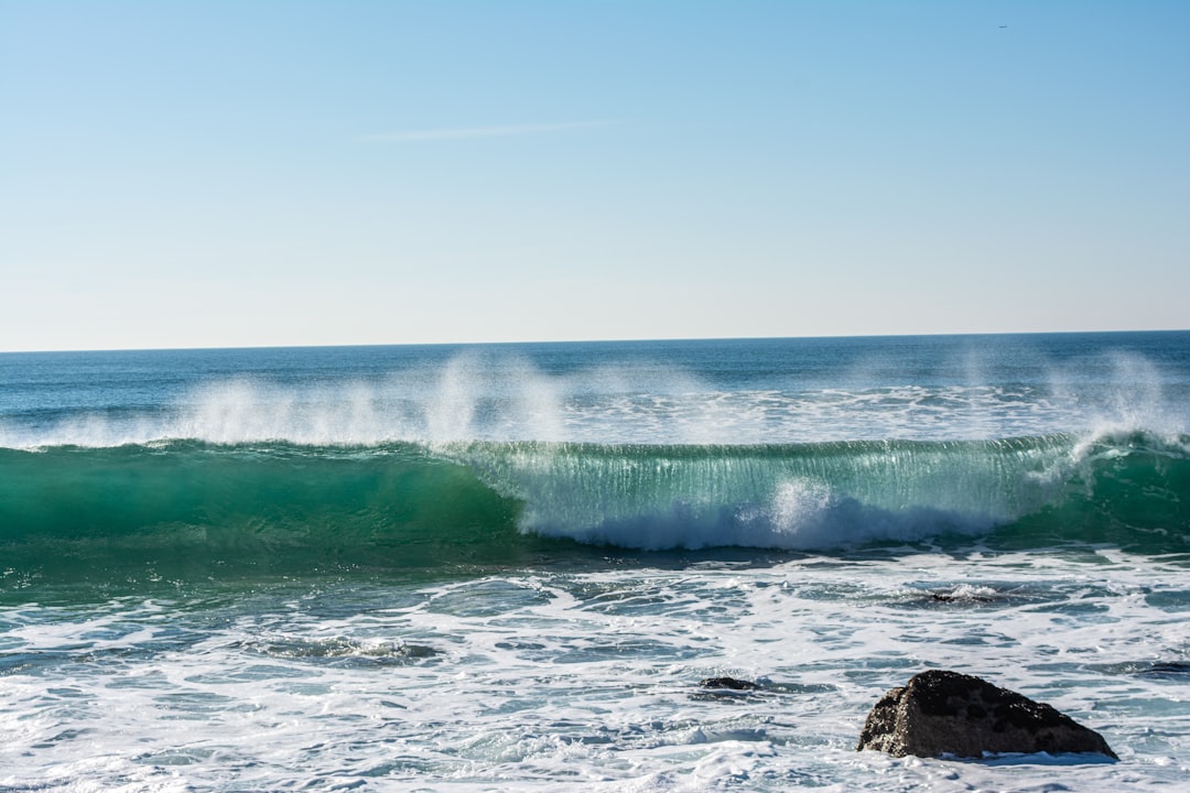 A wave crashing on the coast