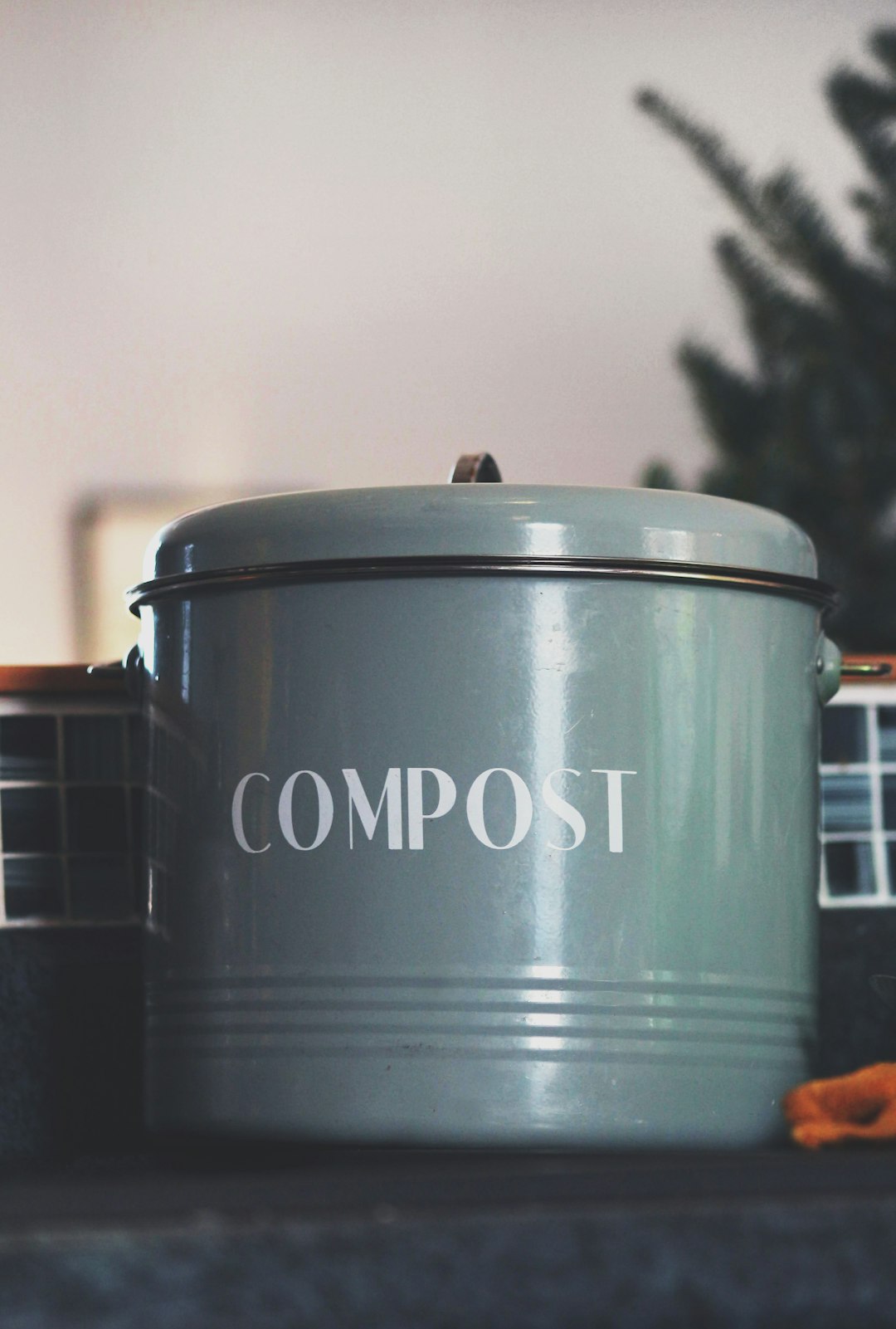 gray compost metal pot