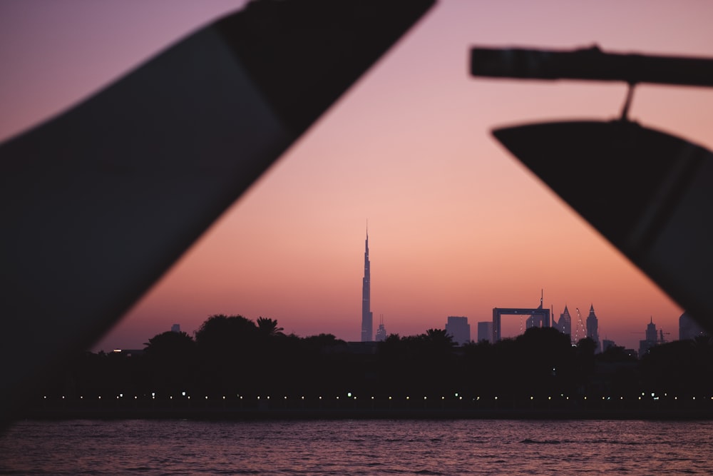 silhouette photography of cityscape during golden hour