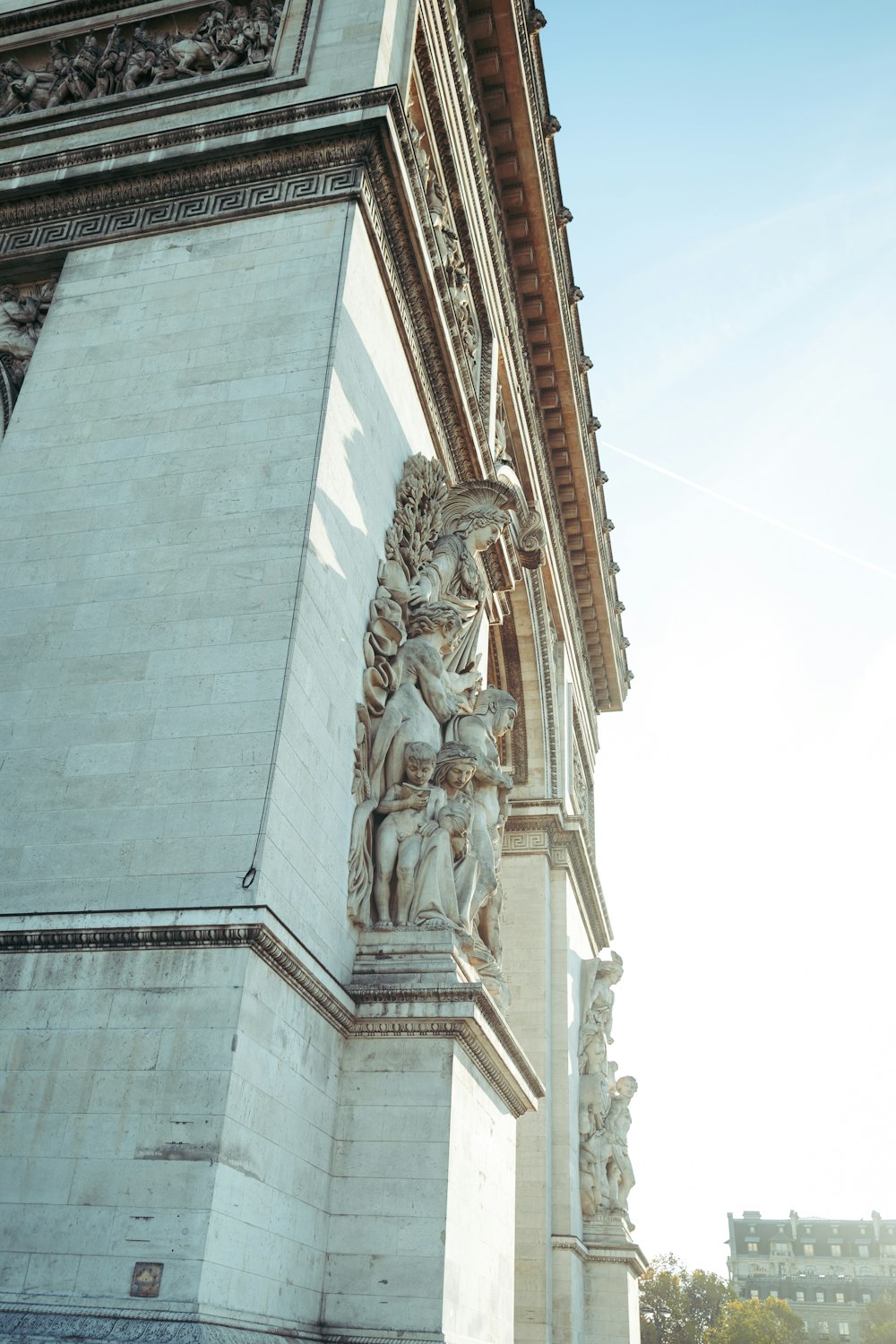 low-angle photography of Arch de Triomphe in Paris