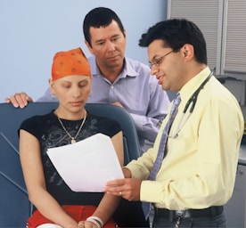 Doctor is explaining a report to a patient