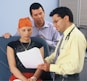 doctor delivering results to tumor patient