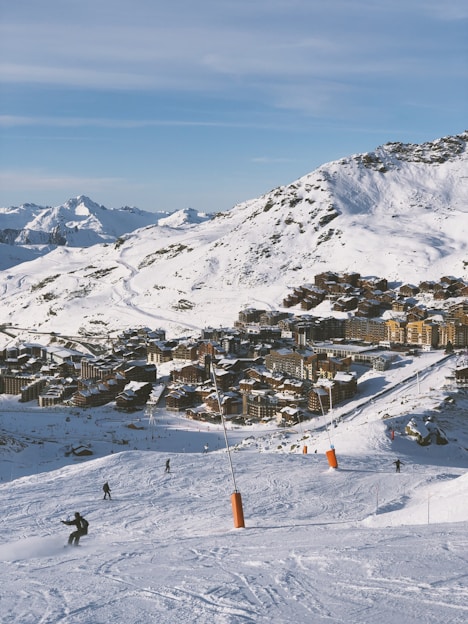 photography of val thorens and mountain range during daytime