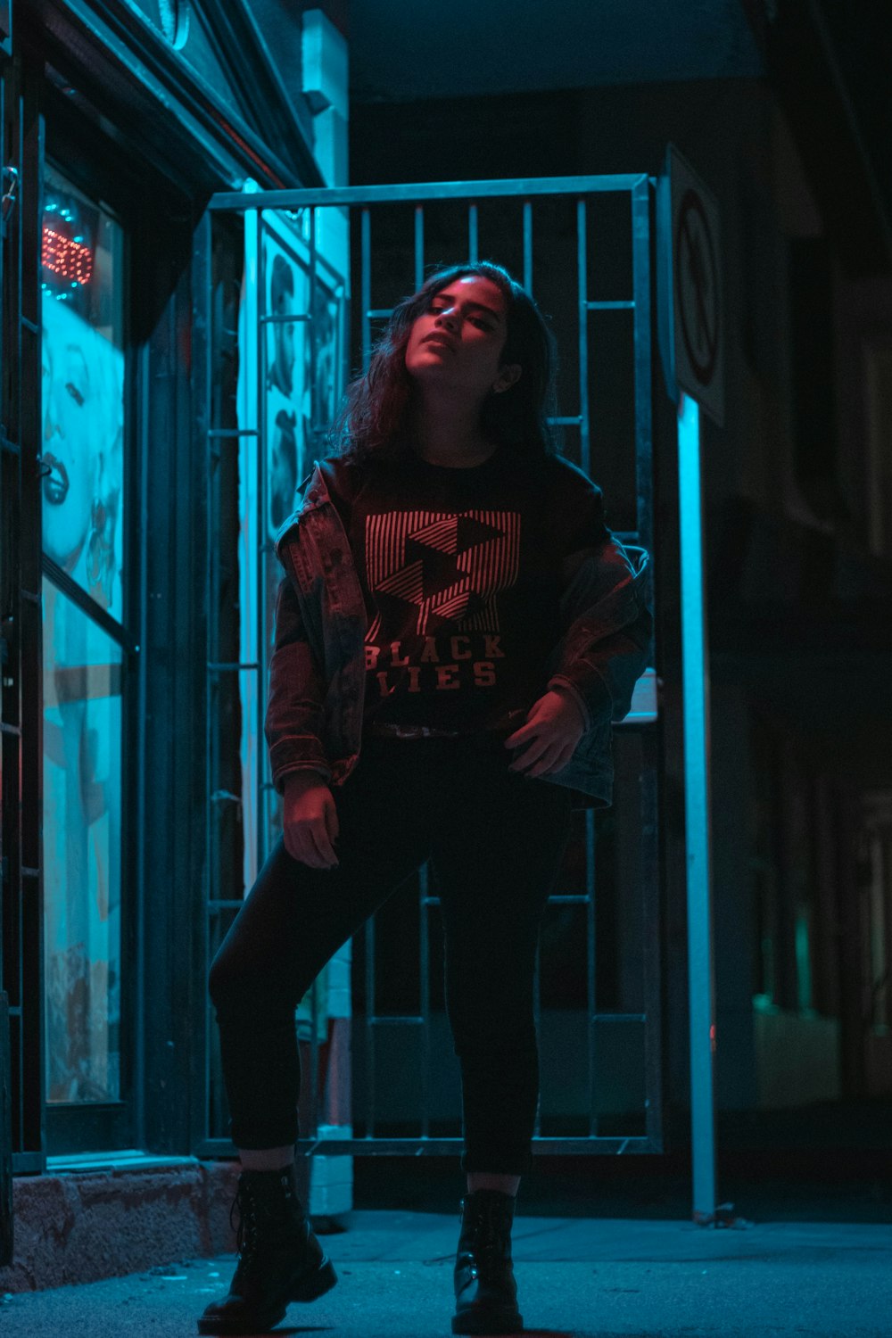 photo-shoot of woman near closed glass door