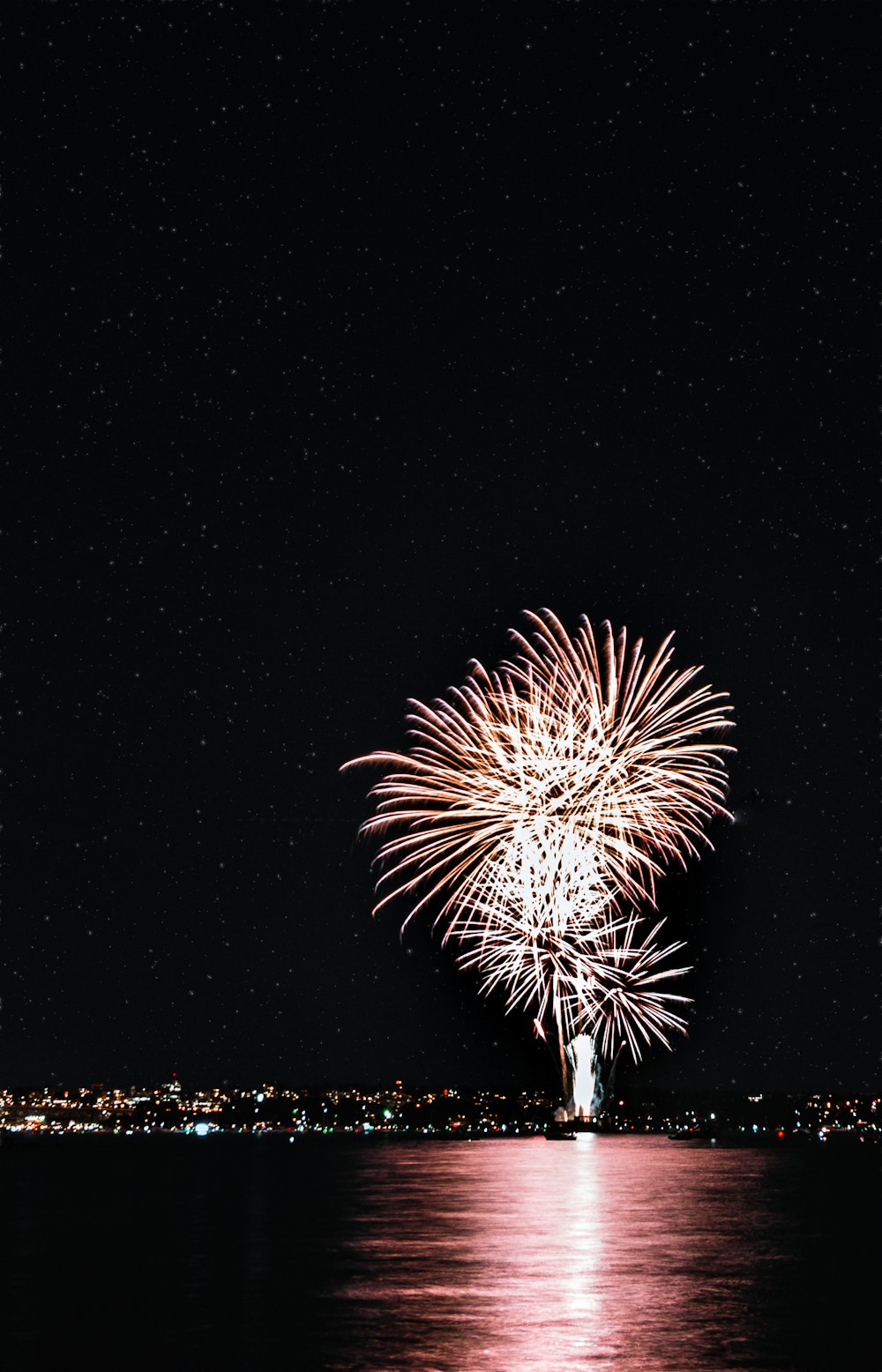 fireworks over body of water