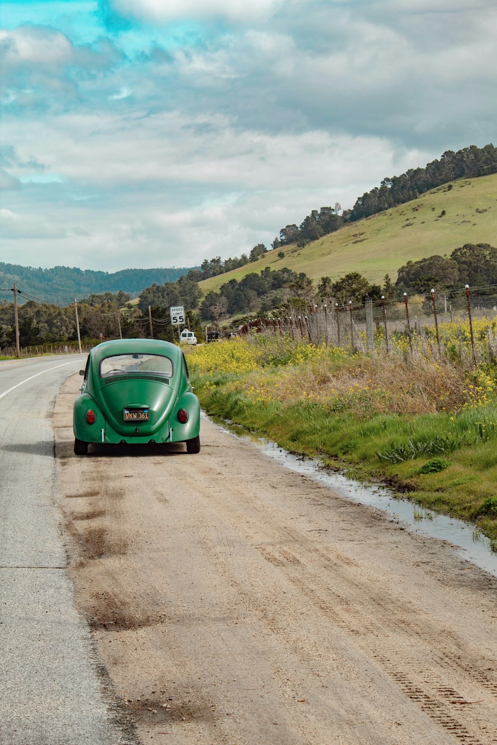 green Volkswagen beetle