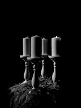 grayscale photography of unlighted candle