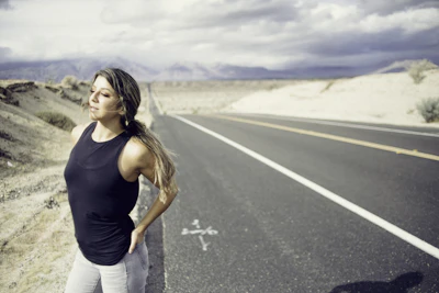 woman standing on the concrete street