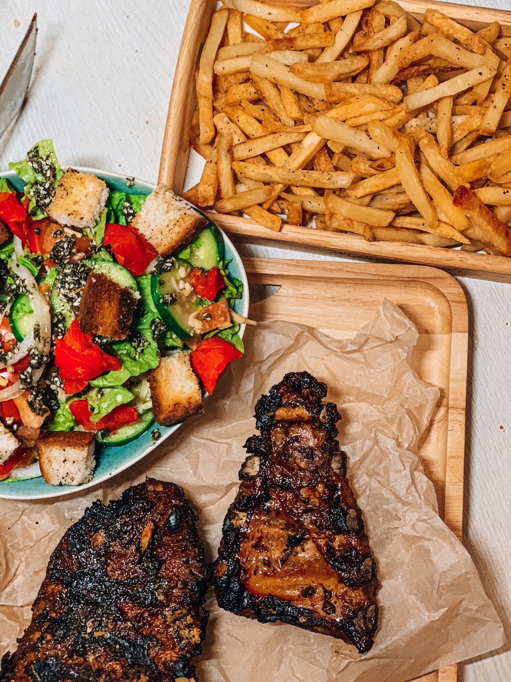 plates of food on white table