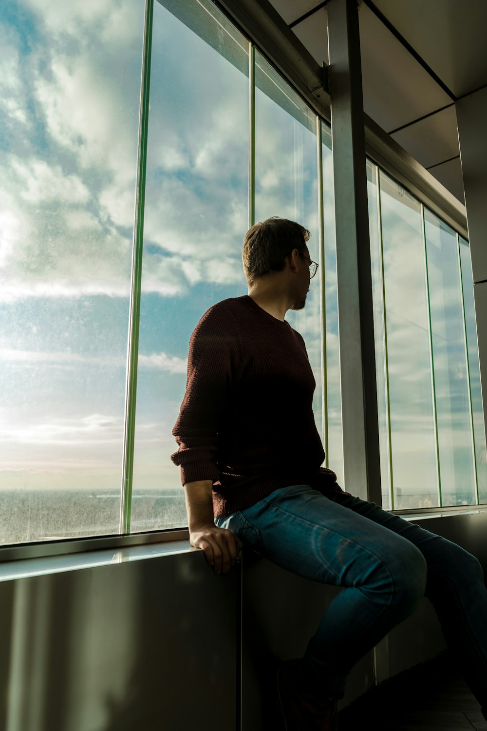 man sitting on the balustrade