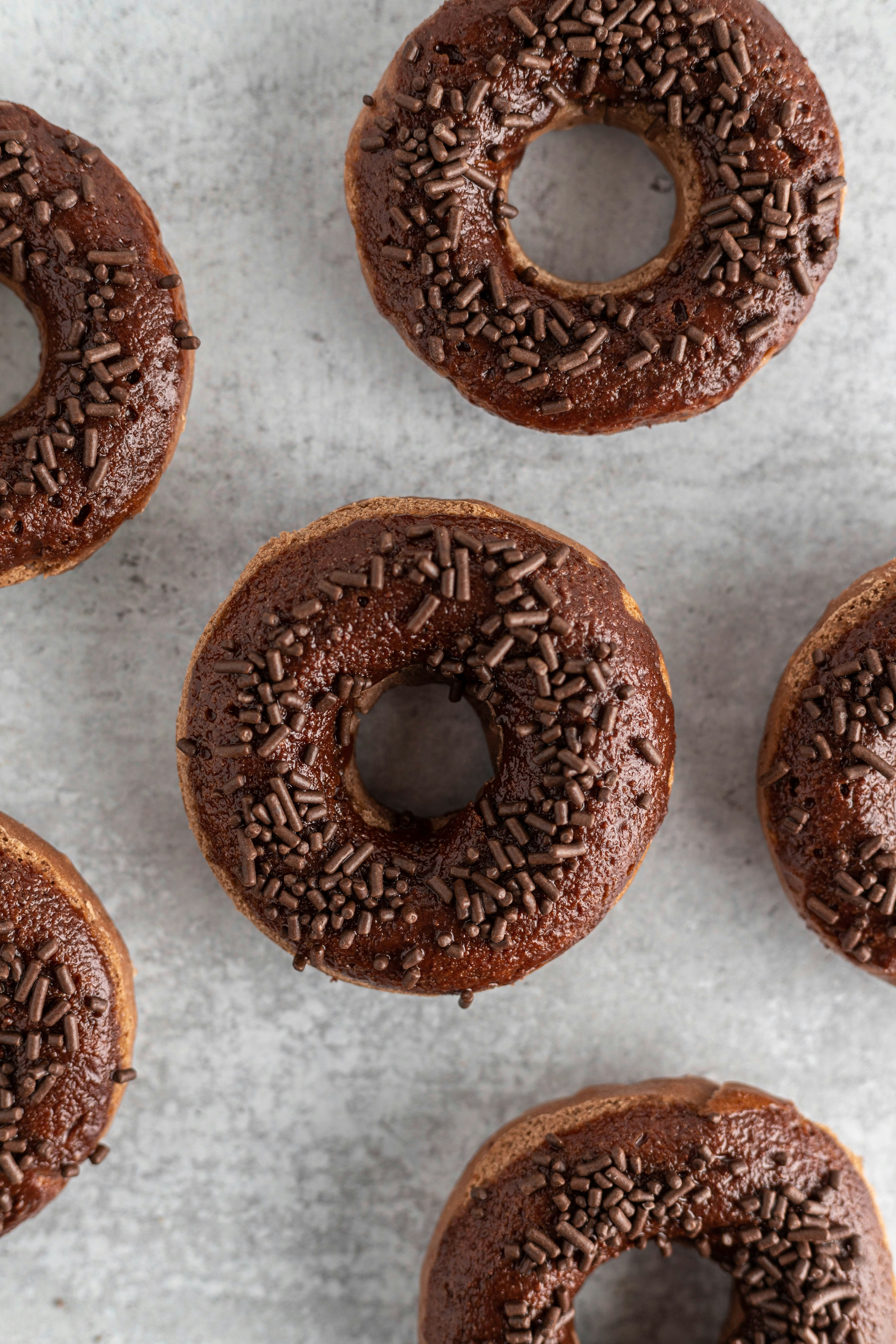 bunch of chocolate doughnuts