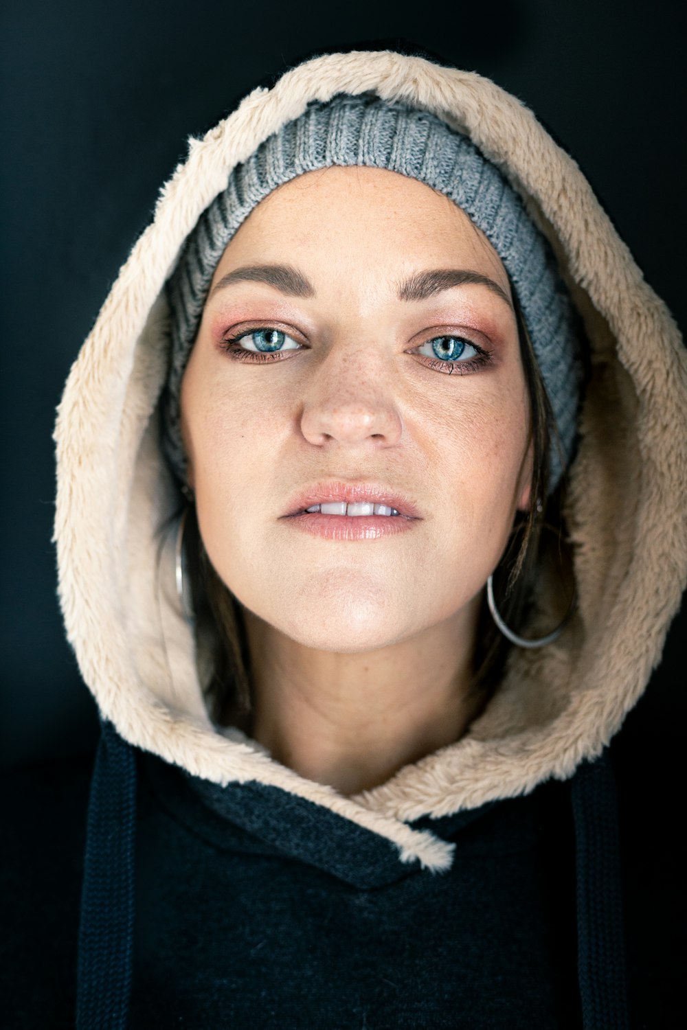 woman wearing black hoodie