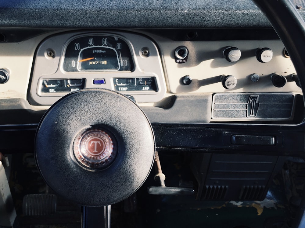 black steering wheel inside vehicle