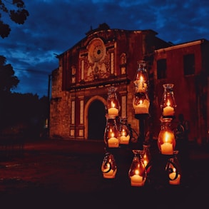 lighted candle at night